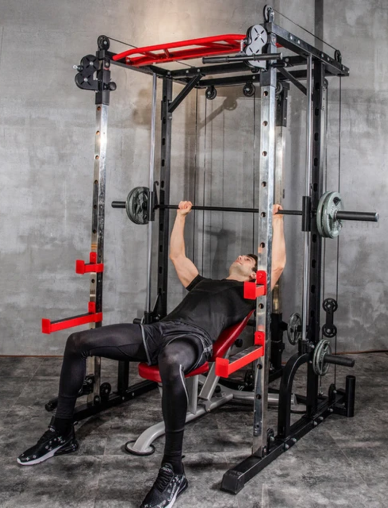 Smith machine with adjustable discount cables